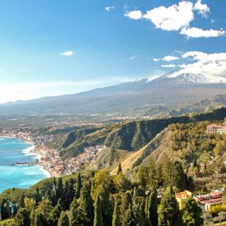 Taormina with brooding Etna behind
