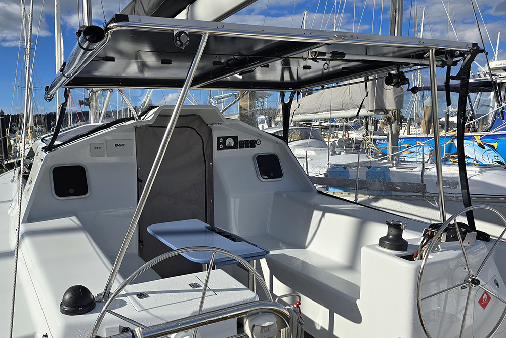 Denim Bimini top with solar panels & drop sides